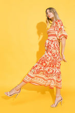 Load image into Gallery viewer, Womens printed woven midi dress featuring square neckline, elbow sleeve, smocked bodice, self sash tie and tiered skirt with ruffled hemline midi dress

